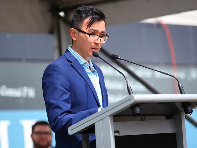 Dr Lin Hu speaking during the unveiling of the Welcome Wall at the Maritime Museum on Sunday.