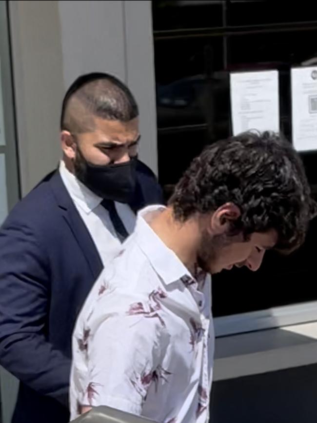 Leonardo Romario Isaac leaving Penrith Local Court with lawyer Jimil Amiri after escaping a conviction from bringing an electric shock device to a brawl at Penrith Hotel.