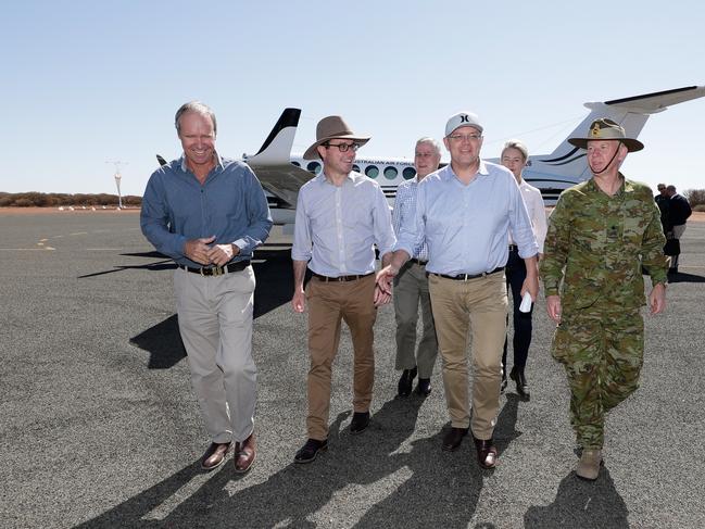 L-R: Quilpie Shire Mayor Stuart Mackenzie, Minister for Agricultre and Water Resources David Littleproud, Deputy Prime Minister Michael McCormack, Prime Minister Scott Morrison, Deputy Nationals Leader Bridget McKenzie and National Drought Coordinator Major-General Stephen Day at Quilpie airport. Picture: Alex Ellinghausen