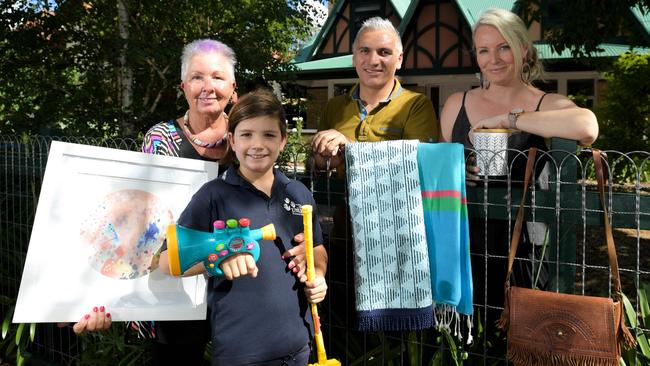 Helen Bennett, Ryan Koch, Deniz Koch and Bec Rodenburg with their wares at the Wattle Street home where markets have been operating for several years. Picture: AAP/Morgan Sette