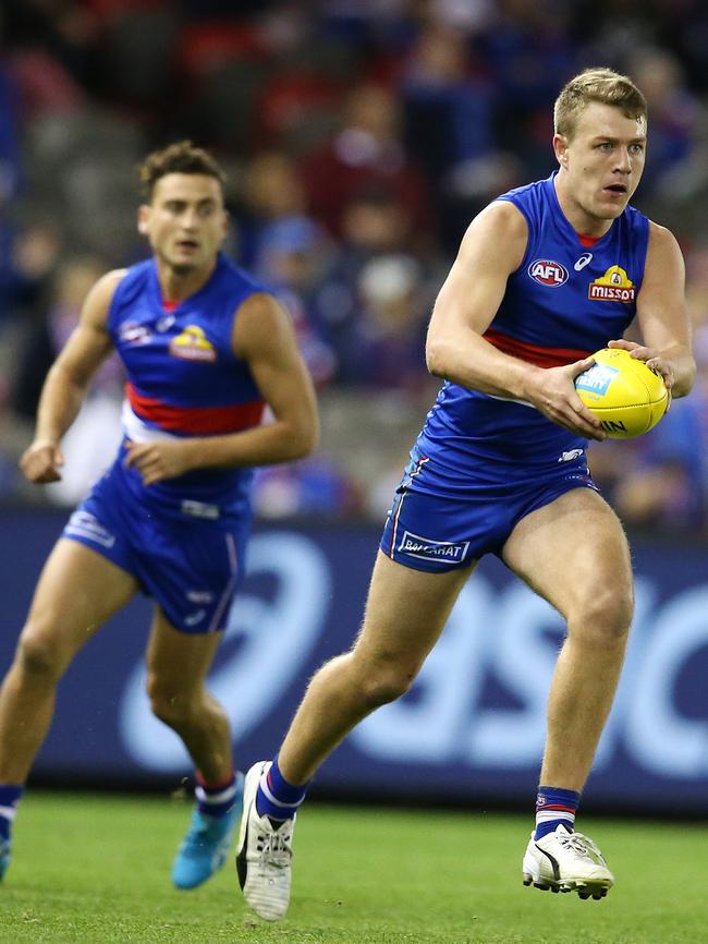 Western Bulldog Jack Macrae charges through half back against Brisbane Lions. Picture: Michael Klein