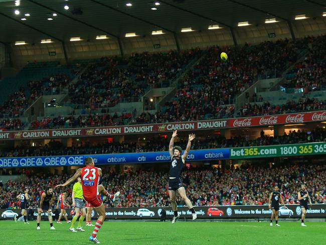 Buddy Franklin kicks for goal in the right forward pocket. Pic Mark Evans