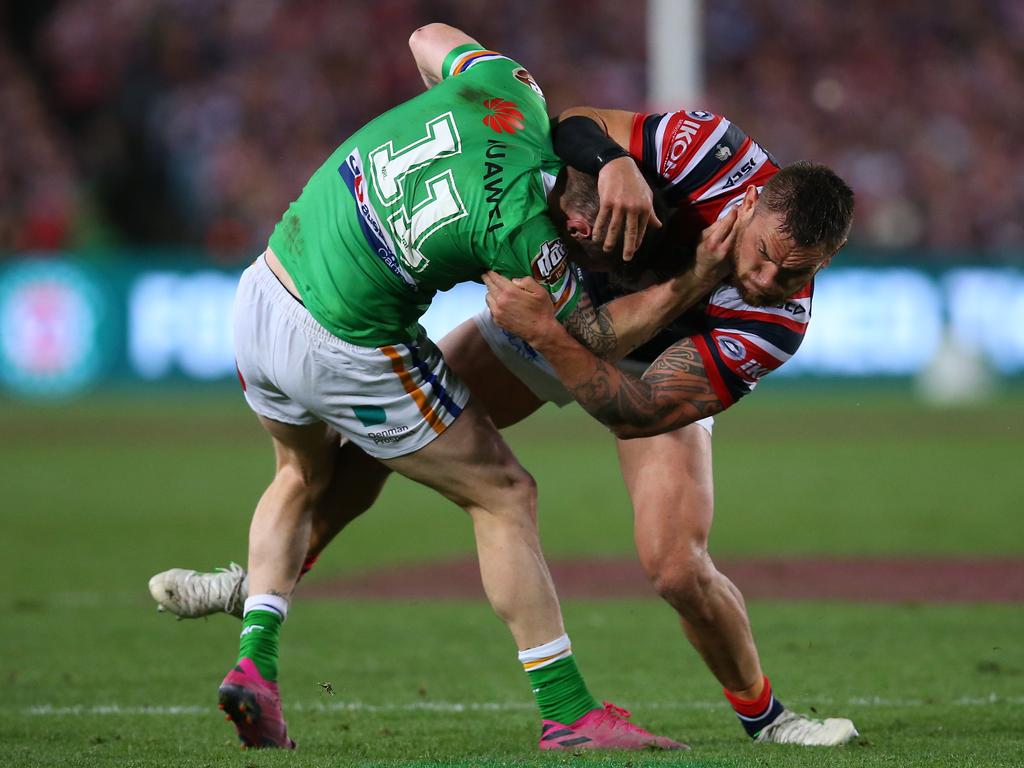 SYDNEY, AUSTRALIA - OCTOBER 06: John Bateman of the Raiders is tackled by Jared Waerea-Hargreaves of the Roosters during the 2019 NRL Grand Final match between the Canberra Raiders and the Sydney Roosters at ANZ Stadium on October 06, 2019 in Sydney, Australia. (Photo by Jason McCawley/Getty Images)