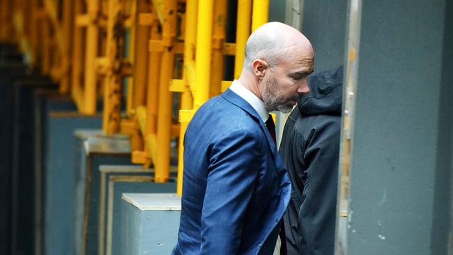 Mayfair 101 chief James Mawhinney enters the Melbourne Magistrates Court on Tuesday. Picture: Enrique Ascui