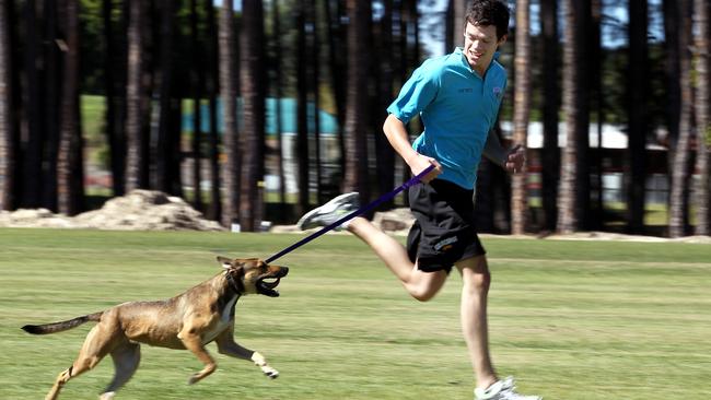 Jason Cadee with dog Peppa at Pizzey Park.