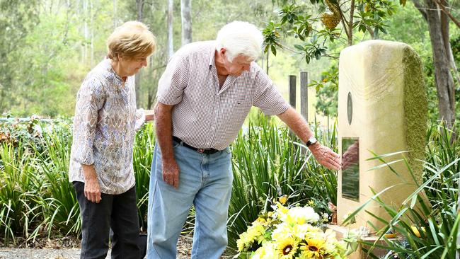 Allison Baden-Clay's parents Geoff and Priscilla Dickie at the restored roadside memorial for their murdered daughter. Picture: Liam Kidston