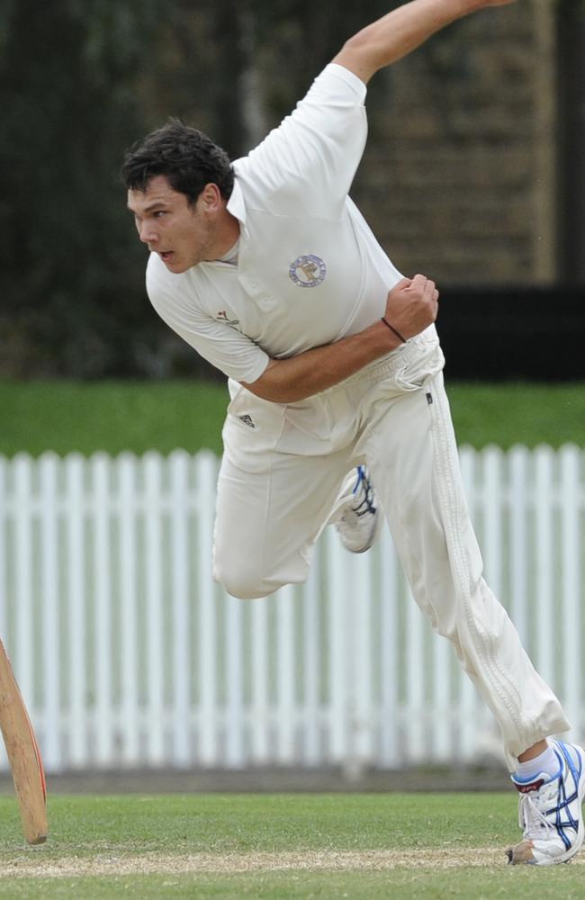 Heat paceman Scott Boland bends his back.