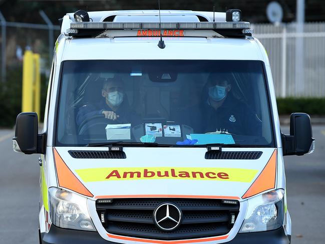 A ambulance leaves the Long Bay Correctional Complex in Sydney, Monday, June 8, 2020. A fight between inmates in Sydney's Long Bay jail has been broken up with tear gas. (AAP Image/Joel Carrett) NO ARCHIVING