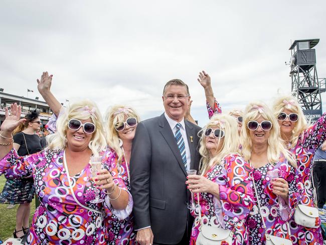 Victorian Premier Denis Napthine taking a punt on the nose on horse Dig A Pony who ended up running third in the 2014 Melbourne Cup. Picture: Jason Edwards.