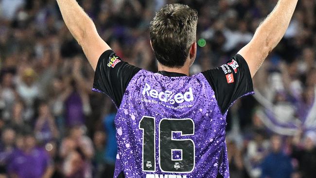 HOBART, AUSTRALIA - JANUARY 27: Mitch Owen of the Hurricanes celebrates the win with fans during the BBL The Final match between Hobart Hurricanes and Sydney Thunder at Ninja Stadium on January 27, 2025 in Hobart, Australia. (Photo by Steve Bell/Getty Images)