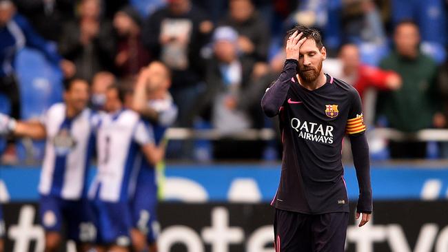 Lionel Messi of FC Barcelona reacts after Deportivo La Coruna score.