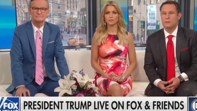 The faces on Fox &amp; Friends hosts Ainsley Earhardt, Steve Doocy and Brian Kilmeade says it all. Picture: Screengrab