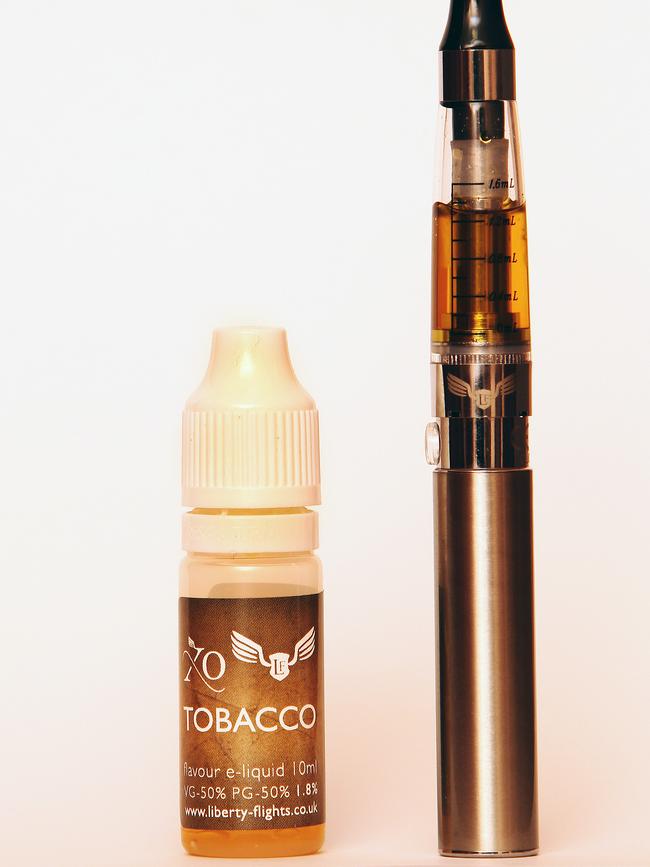 An e-cigarette with nicotine liquid.