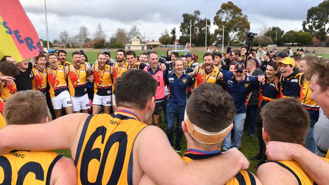 AMATEUR FOOTY: Trinity OS celebrates its division six grand final win over Rosewater in 2018. The club looks set to match that achievement in 2022. Picture: Keryn Stevens