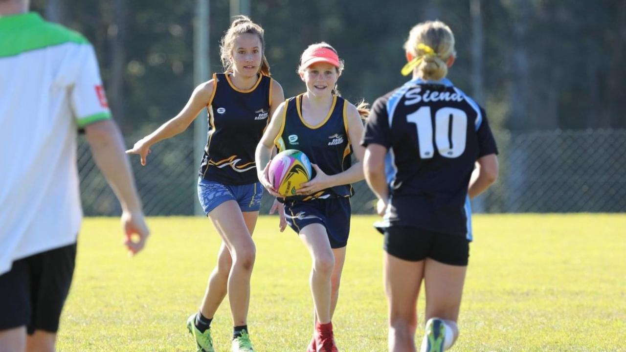 Scarlet Ware from Bribie Island State High runs the ball during the 2018 Secondary All Schools Championships.