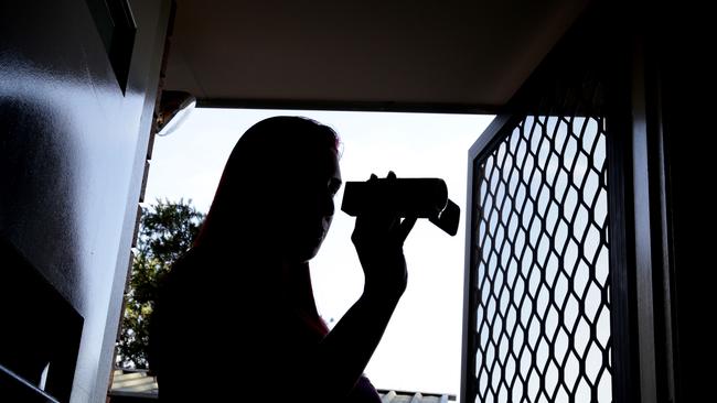 Lipstick Investigations pictured with video camera they use as part of her investigations.