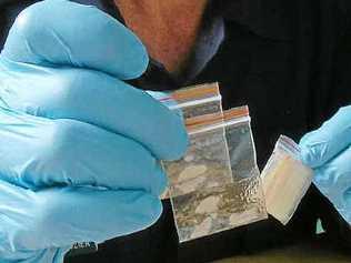 Senior Constable Blane Crozier conducts forensic analysis on the weekend’s drug seizure. Picture: Mike Knott