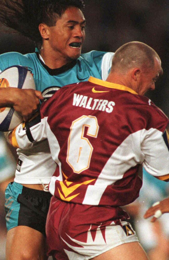 Kevin Walters with his surname on a Broncos jersey in 1997.