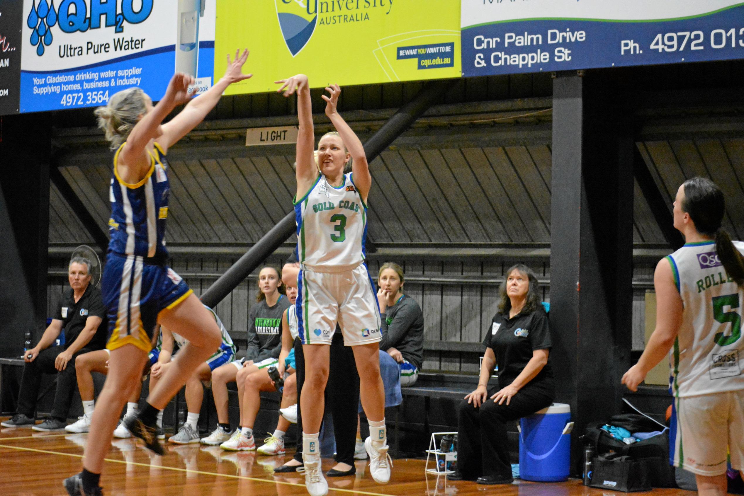 Amanda Beatson tries to stop Sarah Ambrose from shooting. Picture: Nick Kossatch GLA040819QBL