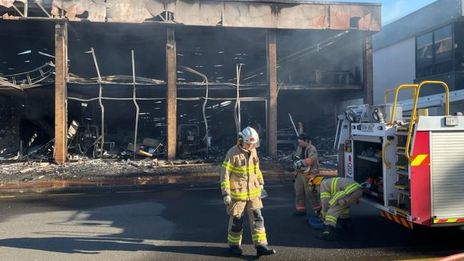 Fire crews remained at the scene on Thursday morning to monitor hot spots. Picture: Dean Martin