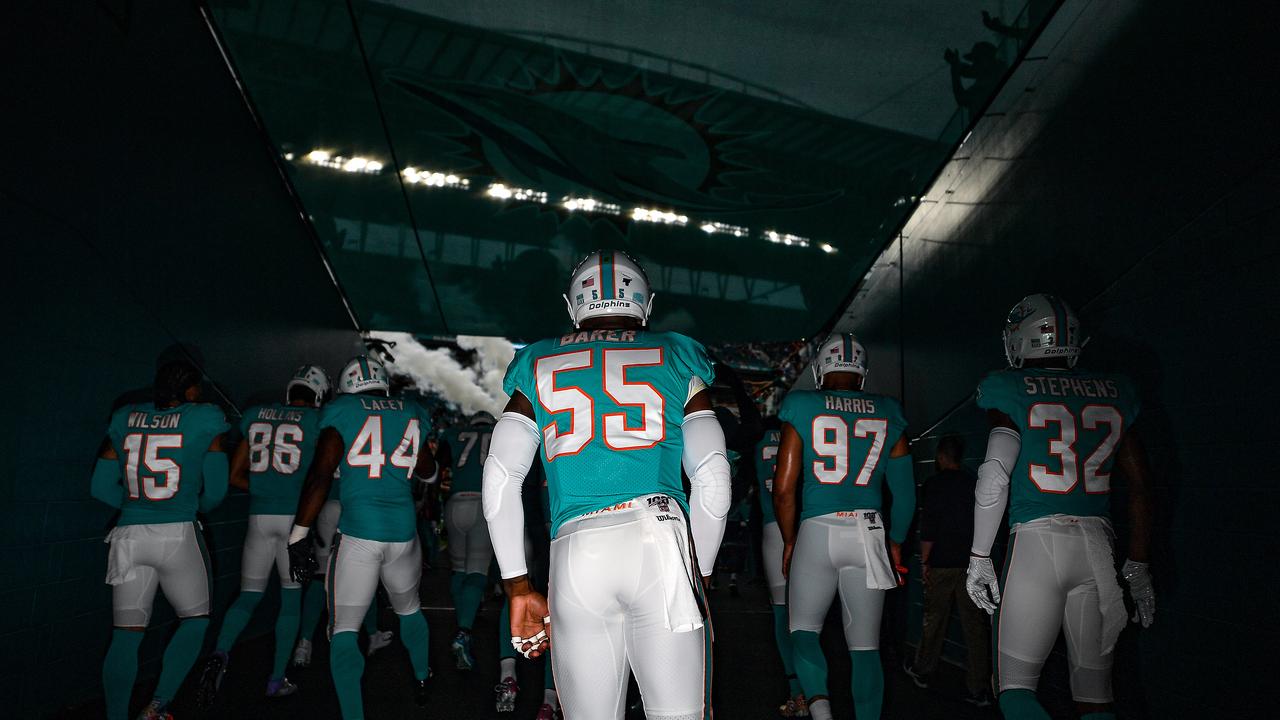 MIAMI, FLORIDA - DECEMBER 22: Jerome Baker #55 and the Miami Dolphins take to the field prior to the game against Cincinnati Bengals at Hard Rock Stadium on December 22, 2019 in Miami, Florida. (Photo by Mark Brown/Getty Images)