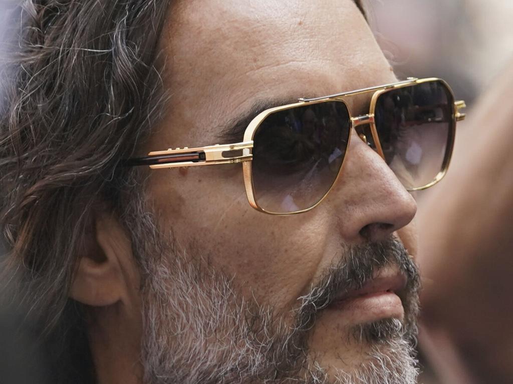 Russell Brand has been accused of dragging another woman towards a male restroom and touching another woman’s breasts without consent, according to new court documents. Picture: AP Photo/Alberto Pezzali