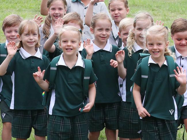 Nine sets of twins  and one set of triplets, lead by Prep students Madelyn and Chloe Boston 4, enrolled at St VincentÃs Primary School at Clear Island Waters, ready to head back to school. Picture Glenn hampson