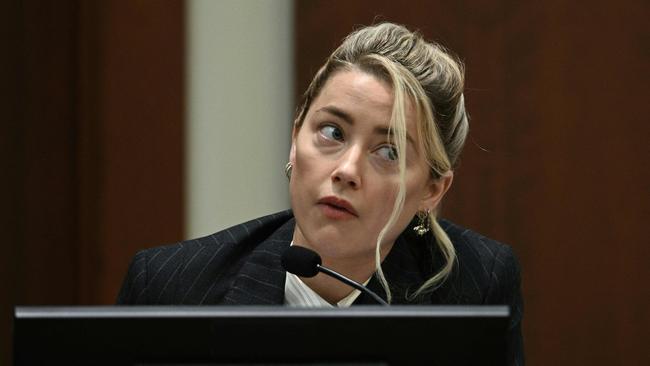 Amber Heard in court today: “Why can’t he look at me?” Picture: AFP