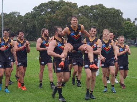 Old Yarra Cobras half back James Fleming being chaired off after his 100th game on Saturday. Picture: Supplied.