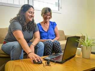 NEW WORLD: Welcoming Intercultural Neighbours' Natalia Muszkat assists Sue Churchill, who will take part in the Be Connected campaign to help "digitally exluded" individuals. Picture: Matt Taylor GLA151018CONN