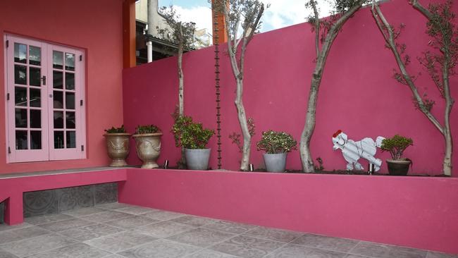 The bright fuschia courtyard. Picture: John Appleyard