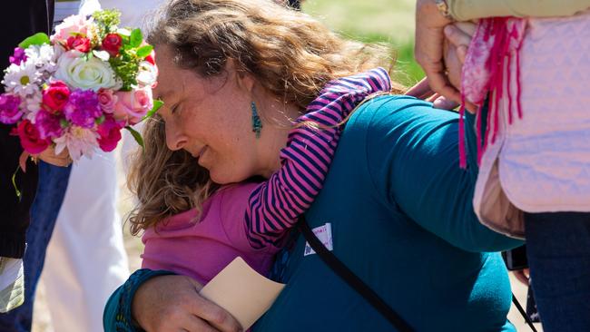 Shanelle Dawson hugs her daughter Kiahla. Walk for Lyn Dawson at Long Reef Surf Club in Sydney NSW. Lyn went missing in 1982, and her body has never been found. Sunday 30th September 2018. Picture: Jordan Shields.