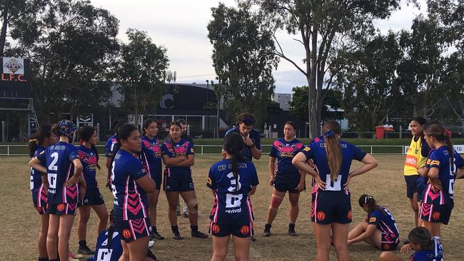 Mabel Park SHS listen to the halftime address.