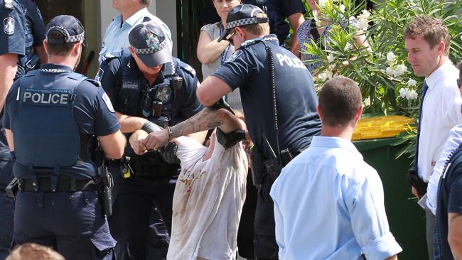 Police arrest the man. Photo: Mike Batterham