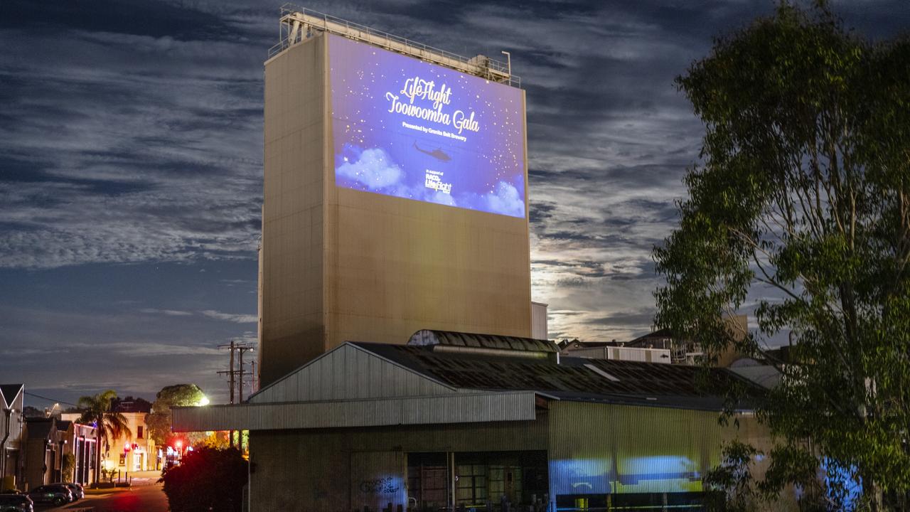 Video is projected onto a Mills Precinct structure for the LifeFlight Toowoomba Gala at The Goods Shed, Saturday, May 6, 2023. Picture: Kevin Farmer