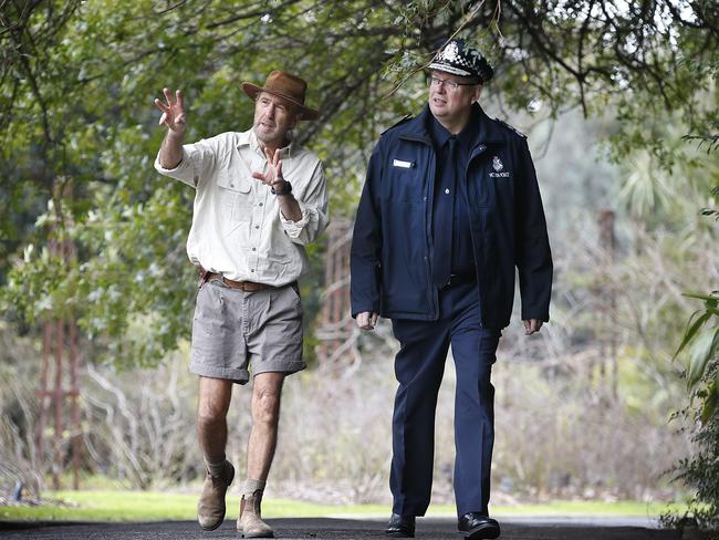 Russell Coight warns Graham Ashton of the dangers of snakes and frostbite. Picture: David Caird