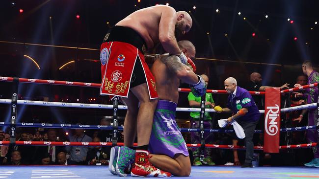 RIYADH, SAUDI ARABIA - DECEMBER 21: Tyson Fury and Oleksandr Usyk embrace following the IBF, IBO, WBA, WBC and WBO Undisputed World Heavyweight titles' fight between Oleksandr Usyk and Tyson Fury as part of Oleksandr Usyk v Tyson Fury 2, Reignited card at Kingdom Arena on December 21, 2024 in Riyadh, Saudi Arabia. (Photo by Richard Pelham/Getty Images)