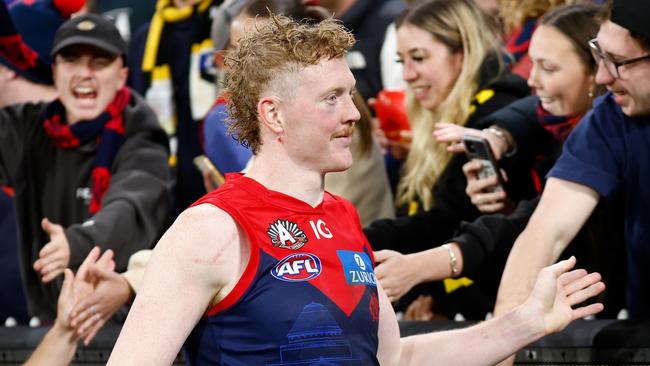 Melbourne star Clayton Oliver has been praised for his ‘selfless’ efforts while battling a finger injury before the Demons’ bye. Picture: Michael Willson / Getty Images