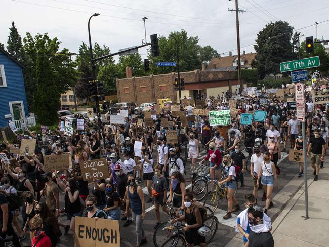 MINNEAPOLIS, MN - JUNE 6: Demonstrators calling to defund the Minneapolis Police Department march on University Avenue on June 6, 2020 in Minneapolis, Minnesota. The march, organised by the Black Visions Collective, commemorated the life of George Floyd who was killed by members of the MPD on May 25. Stephen Maturen/Getty Images/AFP == FOR NEWSPAPERS, INTERNET, TELCOS &amp; TELEVISION USE ONLY ==