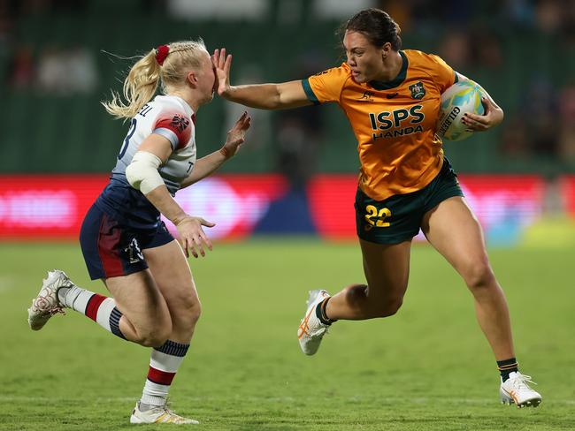 Bienne Terita of Australia fends off Heather Cowell of Great Britain in the 2024 Perth SVNS women’s match. Picture: Paul Kane/Getty Images