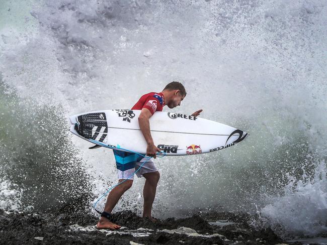 To its disciples, surfing is more a way of life: part hobby, part meditation, part craft, part art form. Picture: Nigel Hallett
