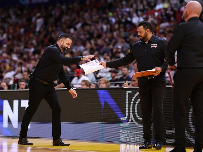 Taipans head coach Adam Forde with Kerry Williams at Qudos Bank Arena, on February 15, 2023, in Sydney, Australia. (Photo by Mark Metcalfe/Getty Images).