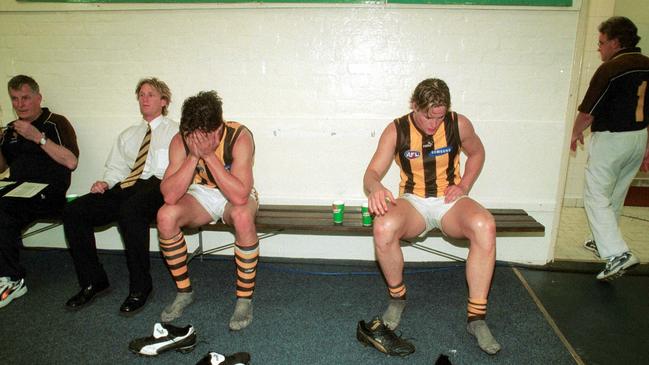 A shattered Nathan Thompson and Trent Croad in the rooms after their 2001 preliminary final loss.