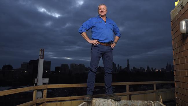 Architectural challenge ... The Block host Scott Cam poses on top of the octagonal building. Picture: Martin Philbey/The Block