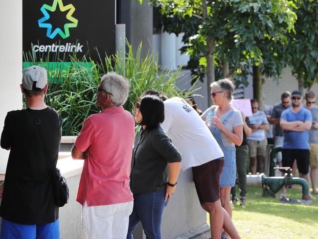 The queue outside Southport Centrelink at 8.40am this morning. Picture Glenn Hampson