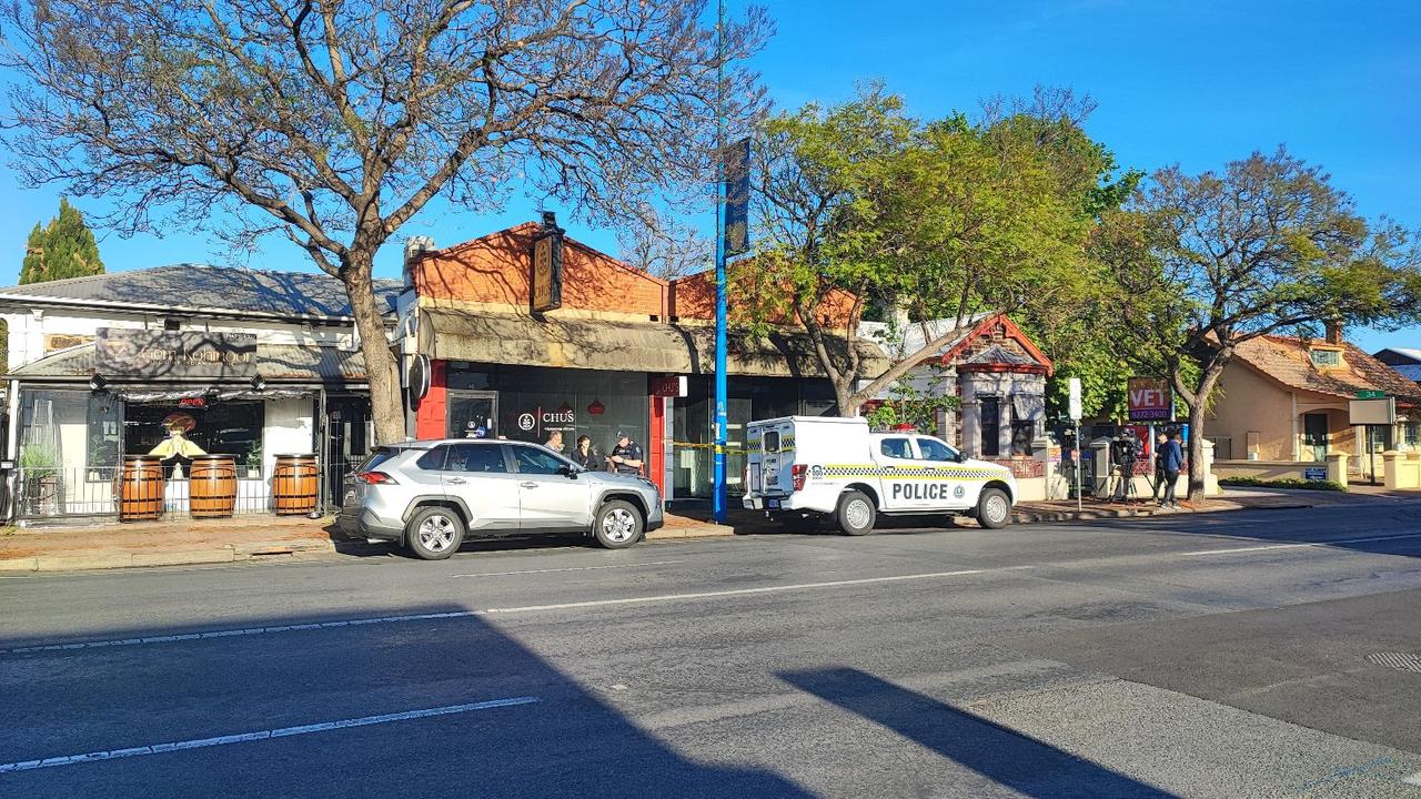 Police at the scene of suspicious fire at a shop on Unley Rd. Picture: Dasha Havrilenko