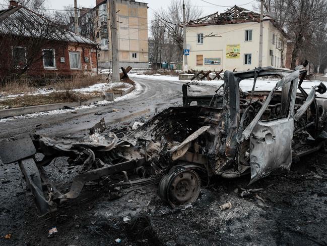 A destroyed car is seen following shellings the night before, in Bakhmut on February 1, 2023, amid the Russian invasion of Ukraine. Picture: AFP