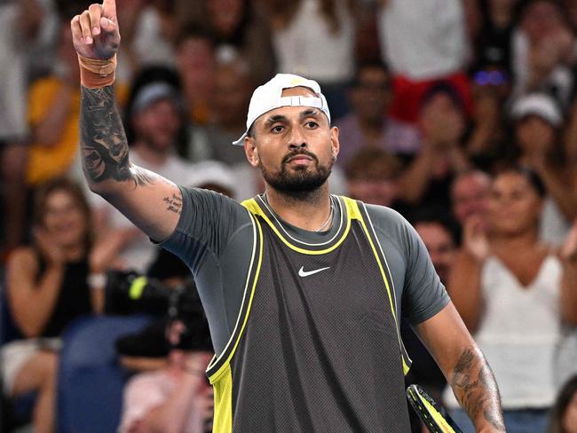 Australia's Nick Kyrgios reacts after winning a game against Britain's Jacob Fearnley during their men's singles match on day two of the Australian Open tennis tournament in Melbourne on January 13, 2025. (Photo by WILLIAM WEST / AFP) / -- IMAGE RESTRICTED TO EDITORIAL USE - STRICTLY NO COMMERCIAL USE --