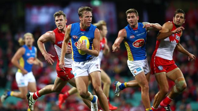 Gold Coast’s Jack Lukosius breaks away against the Swans at the SCG. Picture: Cameron Spencer/AFL Photos