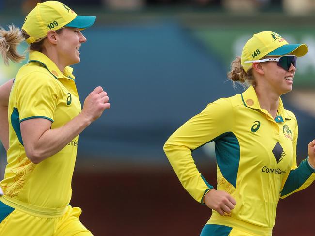 MELBOURNE, AUSTRALIA - OCTOBER 12: Ellyse Perry (Left) and Phoebe Litchfield of Australia (Right) during game two of the womens One Day International series between Australia and the West Indies at Junction Oval on October 12, 2023 in Melbourne, Australia. (Photo by Asanka Ratnayake/Getty Images)